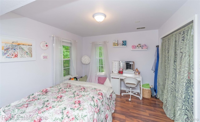 12267 Saint Andrews Way, Fenton, MI 48430 - bedroom with dark wood-type flooring