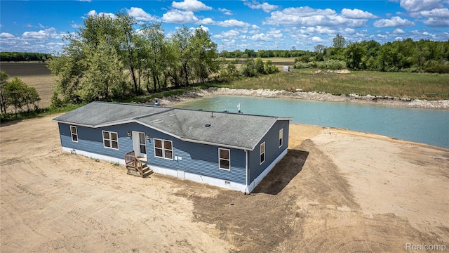 5730 Cavendar Dr, Mount Pleasant, MI 48883 - aerial view of property and surrounding area featuring a nearby body of water
