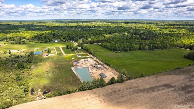5730 Cavendar Dr, Mount Pleasant, MI 48883 - aerial view of a heavily wooded area