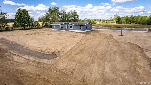 5730 Cavendar Dr, Mount Pleasant, MI 48883 - view of front of property featuring a water view