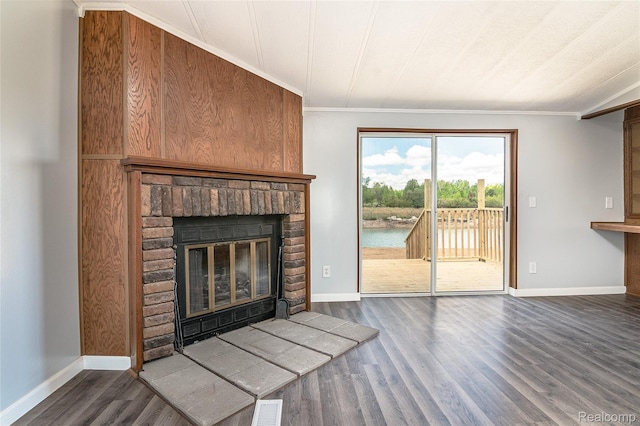 5730 Cavendar Dr, Mount Pleasant, MI 48883 - unfurnished living room with a brick fireplace, wood finished floors, baseboards, and ornamental molding