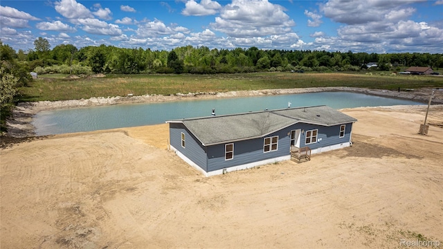 5730 Cavendar Dr, Mount Pleasant, MI 48883 - aerial view of property and surrounding area featuring a nearby body of water