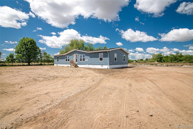 5730 Cavendar Dr, Mount Pleasant, MI 48883 - manufactured / mobile home with driveway and crawl space