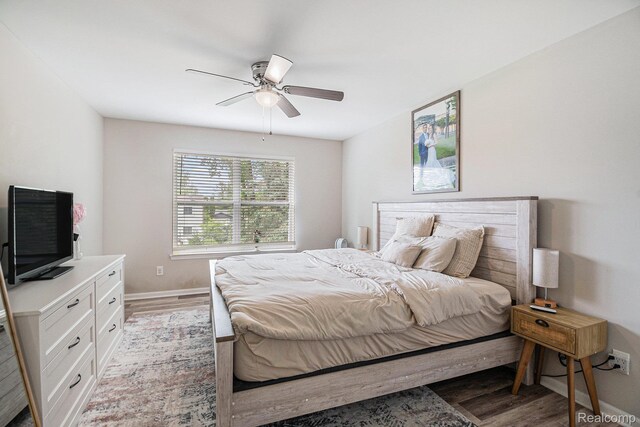 816 Nelsons Ridge Dr, Howell, MI 48843 - bedroom featuring light wood-style flooring, ceiling fan, and baseboards