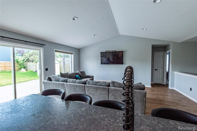 3982 Ontario Dr, Auburn Hills, MI 48326 - living room featuring lofted ceiling, wood finished floors, and recessed lighting