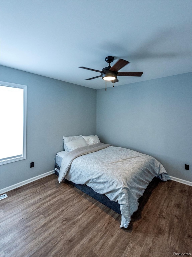 3982 Ontario Dr, Auburn Hills, MI 48326 - bedroom featuring wood finished floors and a ceiling fan