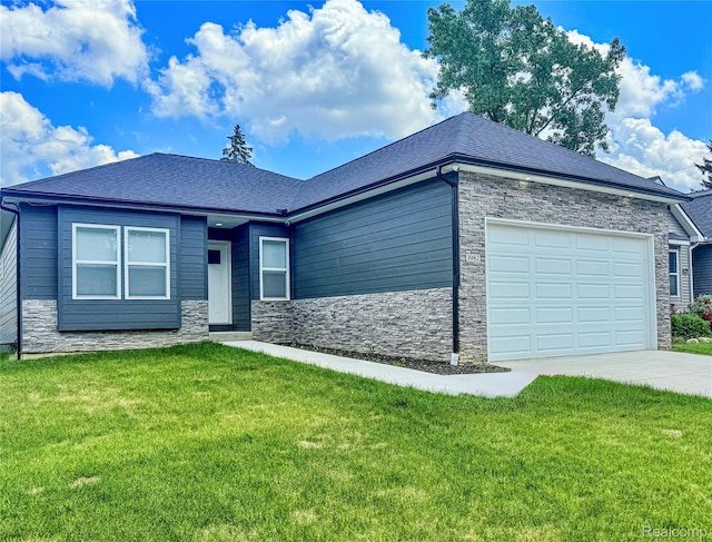 3982 Ontario Dr, Auburn Hills, MI 48326 - view of front of property with stone siding, an attached garage, driveway, and a front yard
