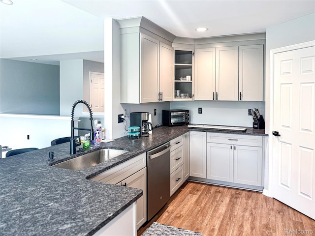 3982 Ontario Dr, Auburn Hills, MI 48326 - kitchen featuring dishwasher, dark stone countertops, light wood-style floors, open shelves, and recessed lighting