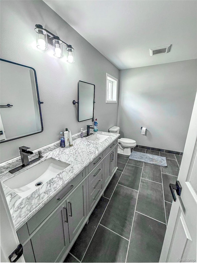 3982 Ontario Dr, Auburn Hills, MI 48326 - full bath with double vanity and tile patterned flooring
