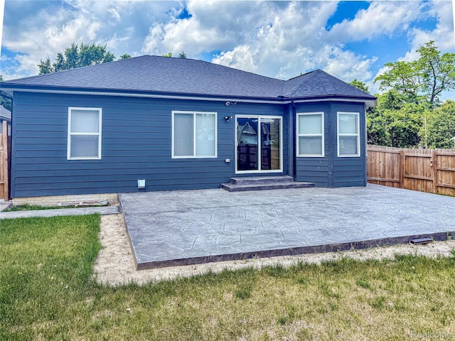 3982 Ontario Dr, Auburn Hills, MI 48326 - back of house with a patio area and a shingled roof