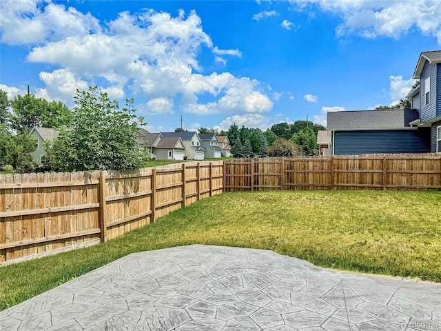 3982 Ontario Dr, Auburn Hills, MI 48326 - fenced backyard featuring a patio and a residential view
