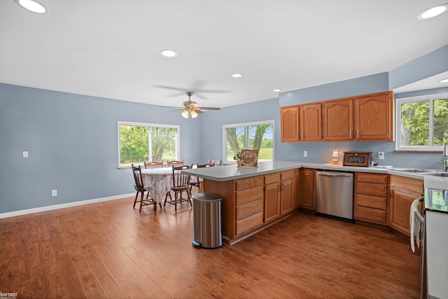2284 E Frances Rd, Clio, MI 48420 - kitchen with appliances with stainless steel finishes, a peninsula, dark wood finished floors, a ceiling fan, and recessed lighting