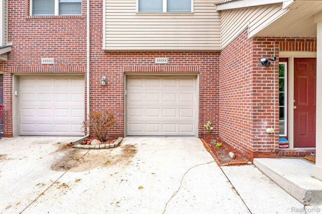 48888 Amanda Ln, Shelby Twp, MI 48317 - garage featuring driveway
