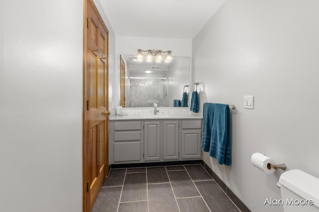 6574 Gran Via Dr NE, Rockford, MI 49341 - full bath with vanity, a shower stall, and toilet