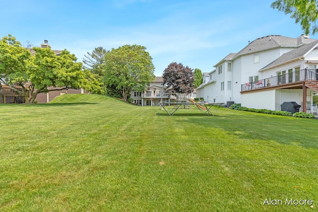 6574 Gran Via Dr NE, Rockford, MI 49341 - view of green lawn featuring central air condition unit