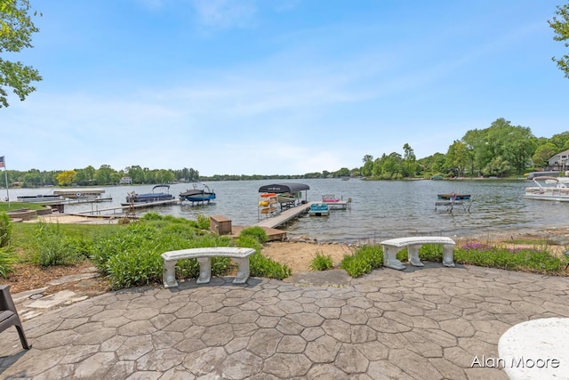 6574 Gran Via Dr NE, Rockford, MI 49341 - dock featuring a water view