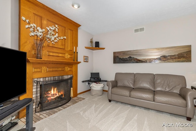 6574 Gran Via Dr NE, Rockford, MI 49341 - carpeted living area with a fireplace and baseboards