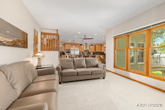 6574 Gran Via Dr NE, Rockford, MI 49341 - living room with light carpet, recessed lighting, and baseboards