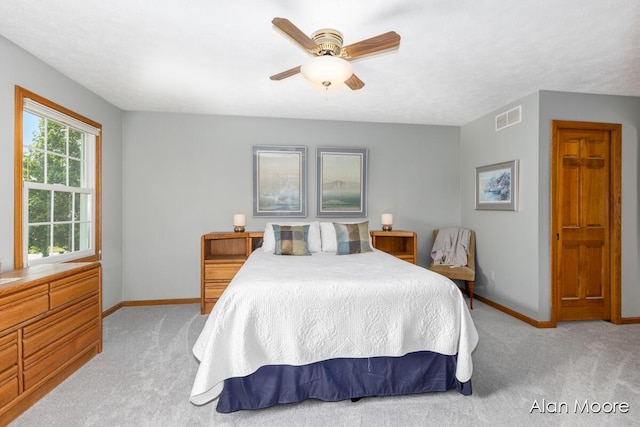 6574 Gran Via Dr NE, Rockford, MI 49341 - bedroom with carpet floors, baseboards, and ceiling fan