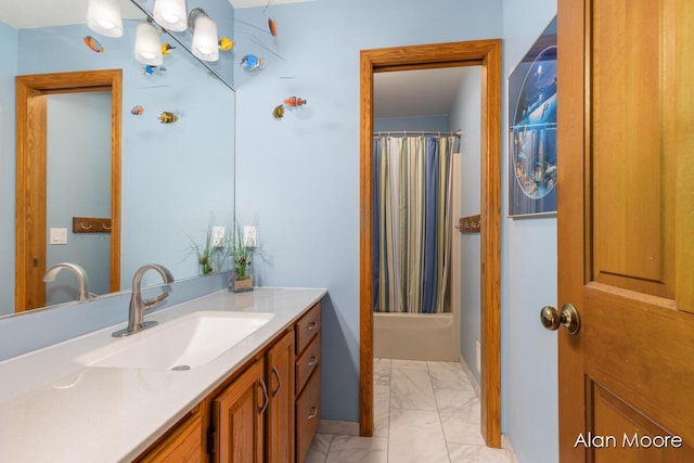 6574 Gran Via Dr NE, Rockford, MI 49341 - full bath featuring marble look tile flooring, vanity, and shower / tub combo