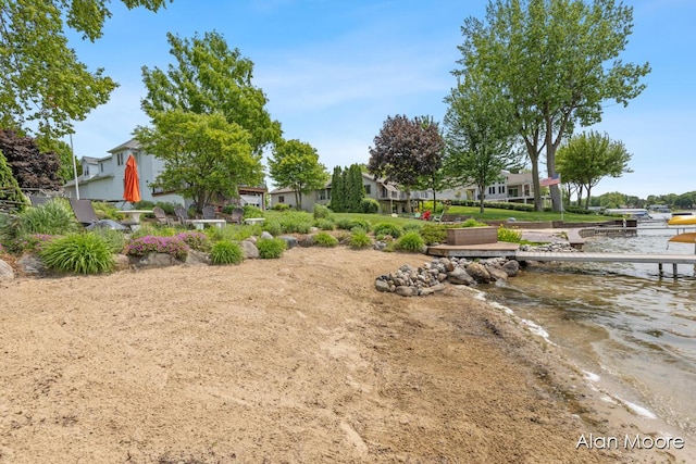 6574 Gran Via Dr NE, Rockford, MI 49341 - view of yard with a water view