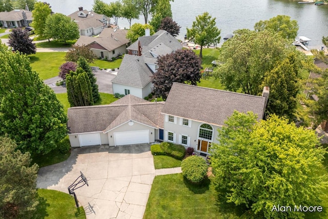 6574 Gran Via Dr NE, Rockford, MI 49341 - aerial perspective of suburban area featuring a large body of water