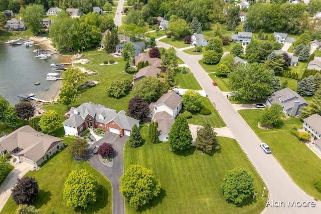 6574 Gran Via Dr NE, Rockford, MI 49341 - aerial perspective of suburban area with a large body of water