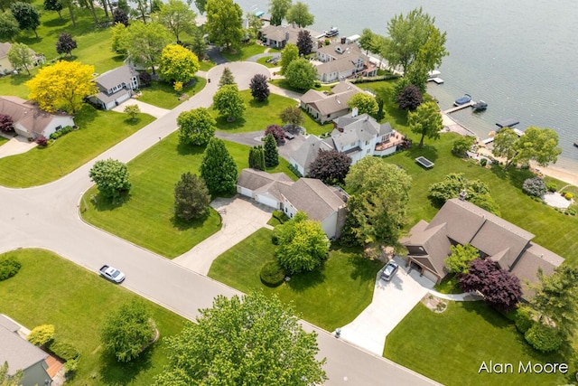6574 Gran Via Dr NE, Rockford, MI 49341 - aerial view of residential area with a nearby body of water