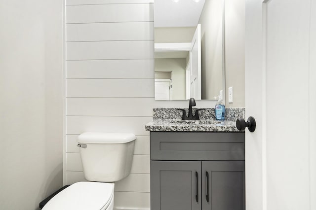 233 Markus Glen Dr, Plainwell, MI 49080 - half bathroom featuring toilet and vanity