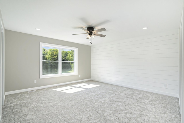 233 Markus Glen Dr, Plainwell, MI 49080 - spare room with carpet floors, ceiling fan, baseboards, and recessed lighting