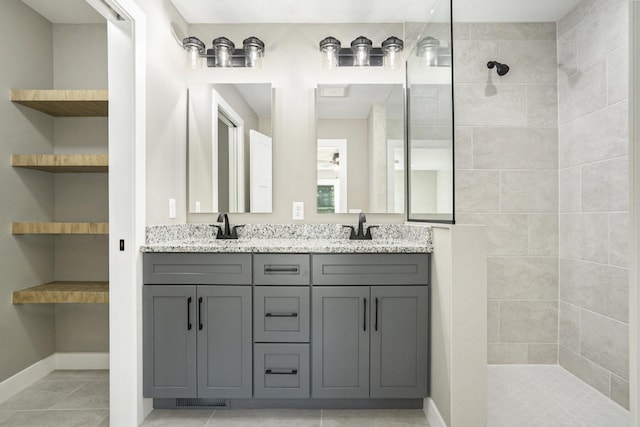 233 Markus Glen Dr, Plainwell, MI 49080 - bathroom with a walk in shower, double vanity, and baseboards