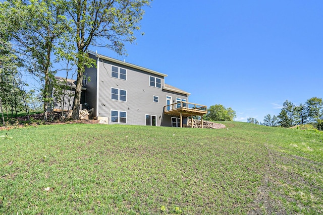 233 Markus Glen Dr, Plainwell, MI 49080 - rear view of property with a lawn and a wooden deck