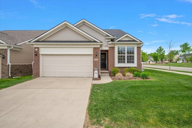 2765 Polson St, Ann Arbor, MI 48105 - view of front of house with brick siding, a front yard, concrete driveway, and a garage