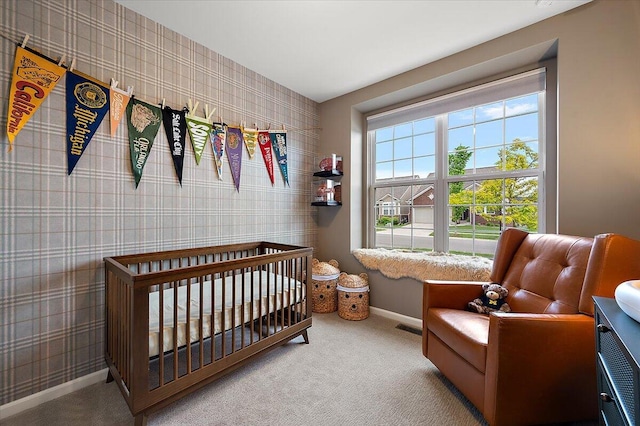 2765 Polson St, Ann Arbor, MI 48105 - bedroom featuring wallpapered walls, baseboards, carpet floors, and a crib