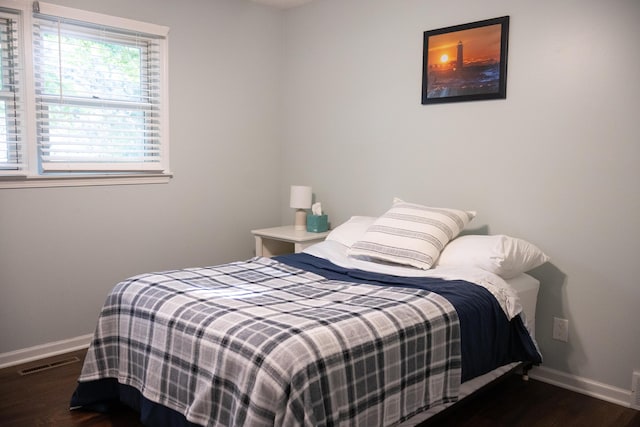 4873 Terrace Ln, Saint Joseph, MI 49085 - bedroom with baseboards and wood finished floors