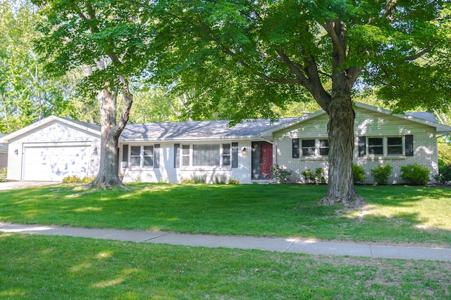 4873 Terrace Ln, Saint Joseph, MI 49085 - single story home with a front yard, brick siding, and a garage