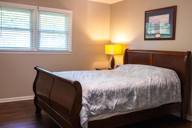 4873 Terrace Ln, Saint Joseph, MI 49085 - bedroom featuring baseboards and wood finished floors