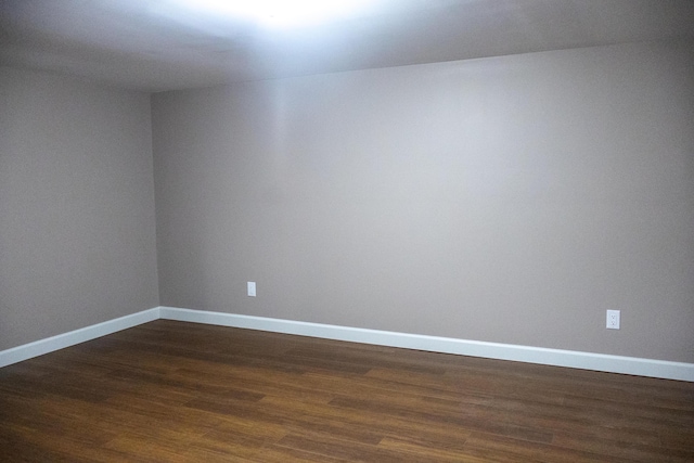 4873 Terrace Ln, Saint Joseph, MI 49085 - unfurnished room with dark wood finished floors and baseboards