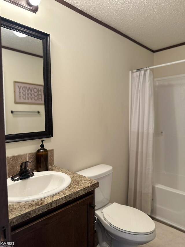 2371 Maple Dr, Fenton, MI 48430 - full bathroom with a textured ceiling, vanity, toilet, shower / tub combo, and crown molding