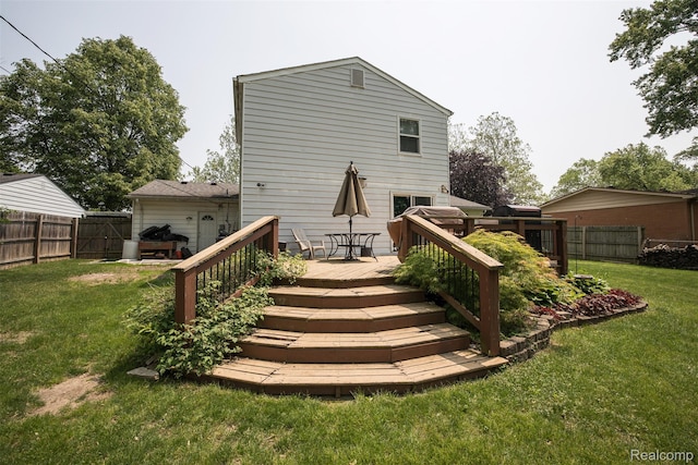 17733 Deering St, Livonia, MI 48152 - back of property featuring a fenced backyard and a wooden deck