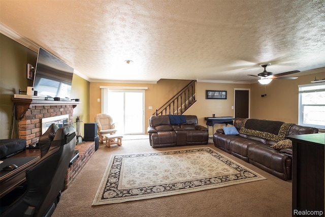 17733 Deering St, Livonia, MI 48152 - carpeted living area featuring a brick fireplace, stairway, a textured ceiling, ornamental molding, and ceiling fan