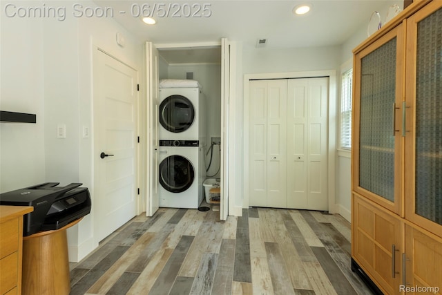 343 Beaupre Ave, Grosse Pointe Farms, MI 48236 - washroom featuring stacked washer / drying machine, wood finished floors, recessed lighting, and baseboards