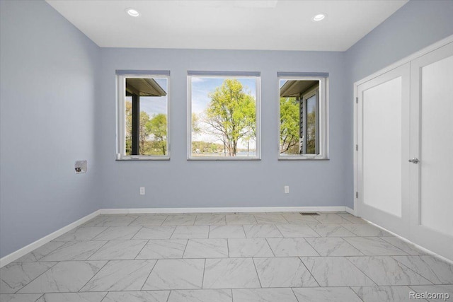 12150 Shaffer Rd, Davisburg, MI 48350 - unfurnished room featuring recessed lighting, baseboards, and light marble finish flooring