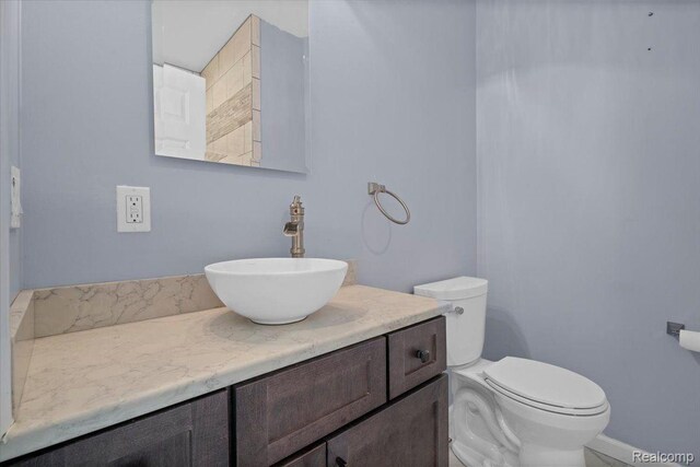 12150 Shaffer Rd, Davisburg, MI 48350 - bathroom with vanity and toilet