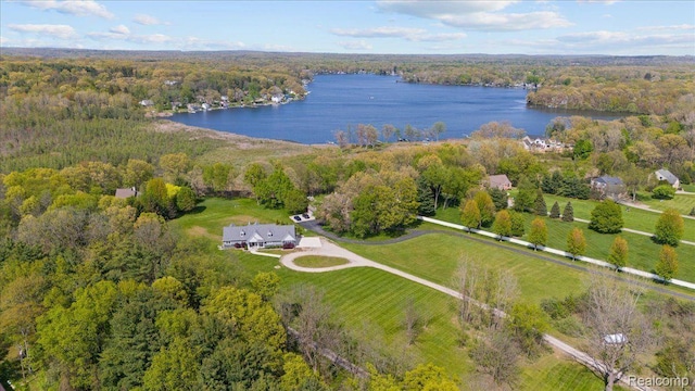 12150 Shaffer Rd, Davisburg, MI 48350 - view of property location with a heavily wooded area and a large body of water