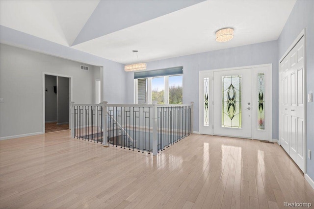 12150 Shaffer Rd, Davisburg, MI 48350 - foyer with hardwood / wood-style floors and baseboards