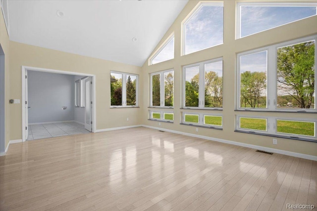 12150 Shaffer Rd, Davisburg, MI 48350 - unfurnished sunroom with lofted ceiling
