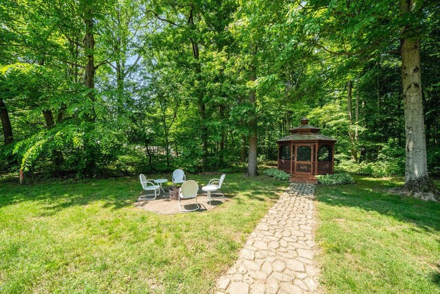 61738 Lake View Dr, Cassopolis, MI 49031 - view of green lawn featuring a gazebo and a patio area