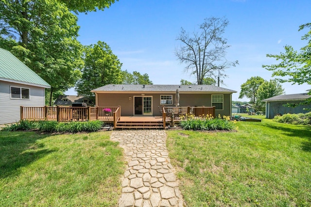 61738 Lake View Dr, Cassopolis, MI 49031 - rear view of house with a wooden deck and a lawn