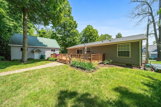 61738 Lake View Dr, Cassopolis, MI 49031 - back of property featuring a deck, a lawn, and metal roof